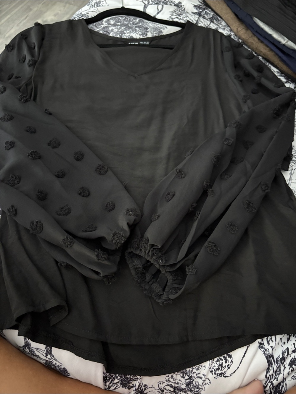 Women’s Black V-Neck Blouse with Textured Dot Sleeves